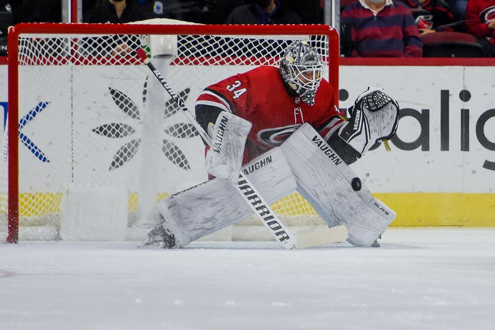 Goaltender Alex Lyon stops the puck in the game against the St. Louis Blues on Saturday, Nov. 13, 2021 in PNC Arena. Lyon had a total of 27 saves in his first start for the Hurricanes. The Hurricanes won3-2.