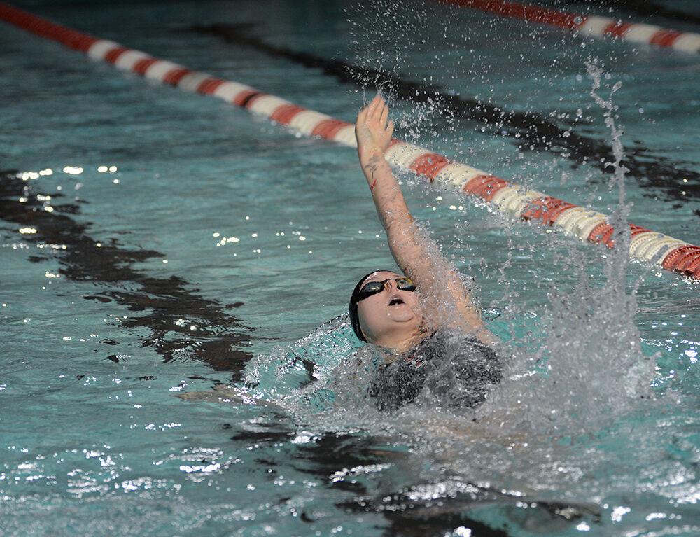 NC State sophomore Katey Lewicki competes 100-yard backstroke during the NC State Wolfpack's swimming and diving meet against the Duke Blue Devils at the Casey Aquatic Center on Saturday, Jan. 15, 2022.&#160;The Pack women beat the Blue Devils 139-87.