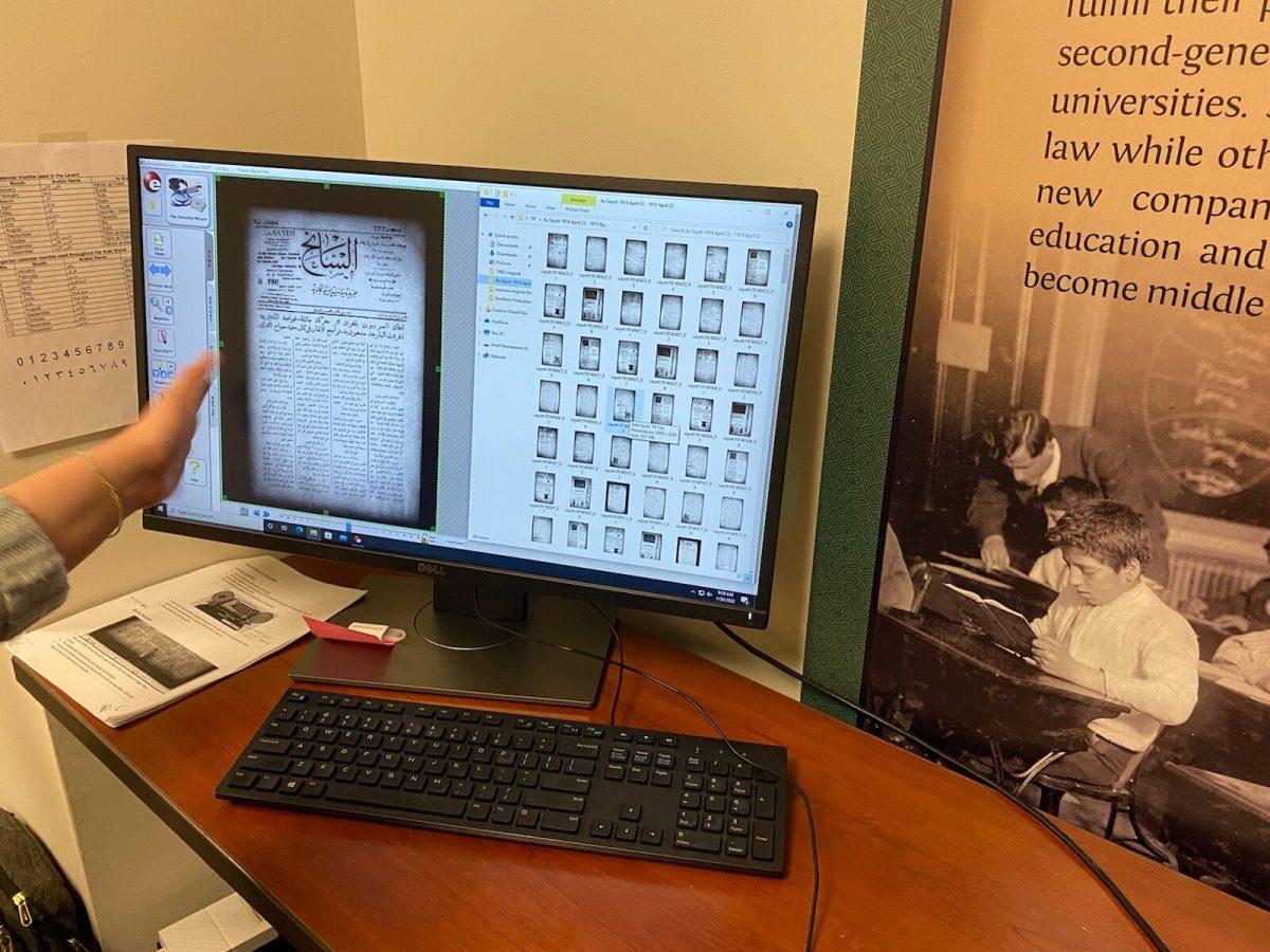 Rachel Acker showing powerscanned newspaper print.&#160;