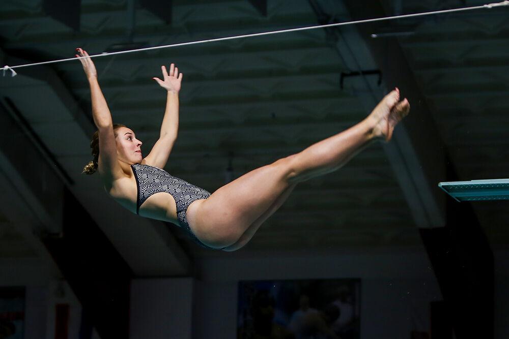 NC State sophomore Clara Tate competes in the women's 1m dive during the NC State Wolfpack's swimming and diving meet against the Duke Blue Devils on Saturday, Jan. 15, 2022.&#160;The Pack women beat the Blue Devils 139-87.