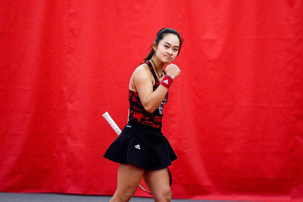 Freshman Priska Nugroho celebrates a point at the tennis match against Penn State at J.W. Isenhour Tennis Center on Saturday, Jan. 29, 2022. NC State beat Penn State 4-0.