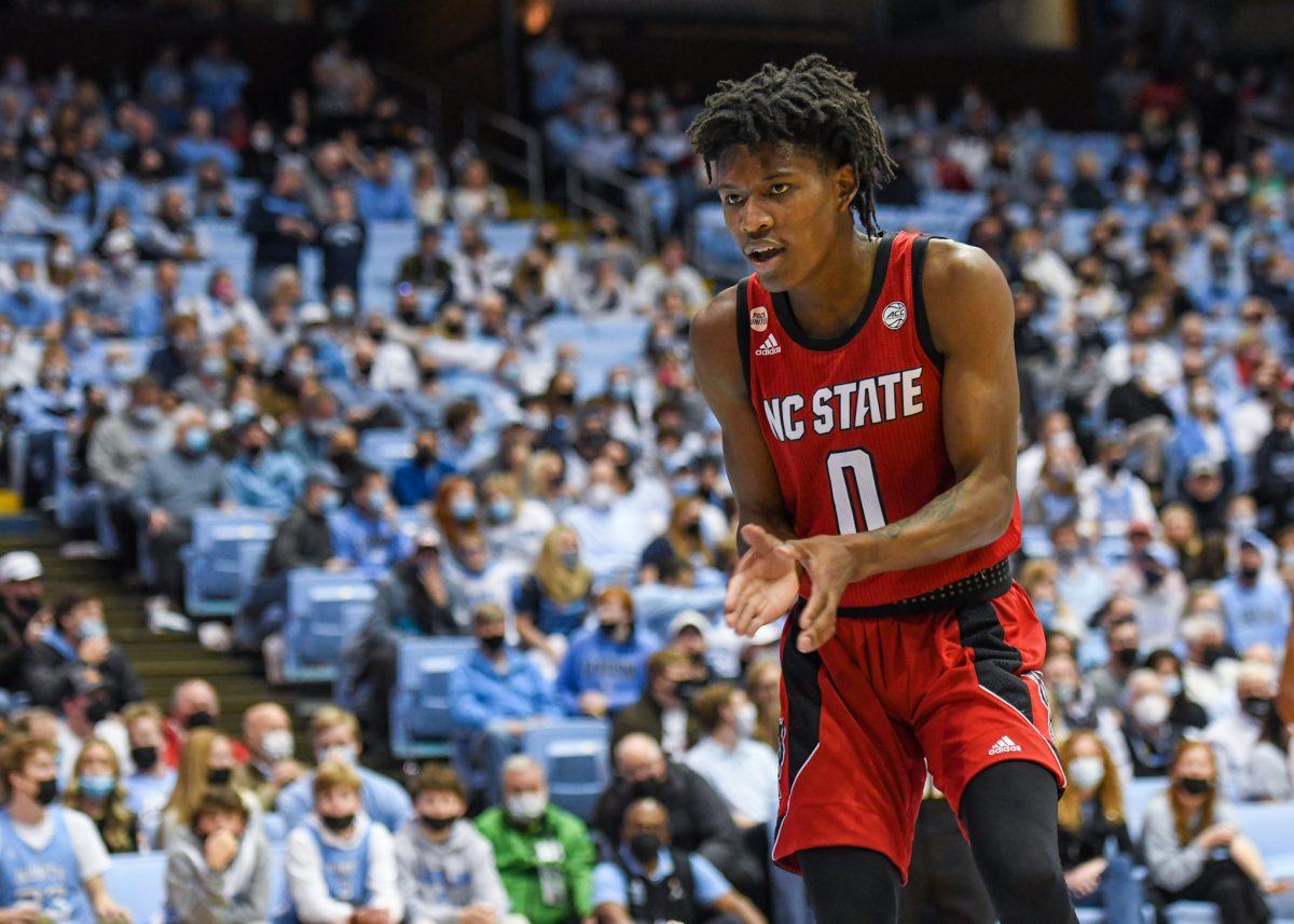 Freshman guard Terquavion Smith hypes himself up before the start of the second half on Saturday, Jan. 29, 2022 in the Dean E. Smith Center. Smith scored a career high of 32 points against UNC. The Wolfpack lost to the Tar Heels 100-80.