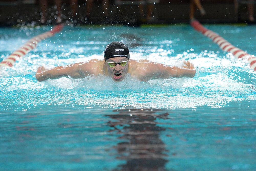 Sophomore Luke Miller competes in the men's 200-yard individual medley during the NC State Wolfpack's swim and dive meet against the UNC-Wilmington Seahawks on Friday, Jan. 28th, 2022 at the Willis R. Casey Aquatics Center. The Pack men beat the Seahawks 184-86.