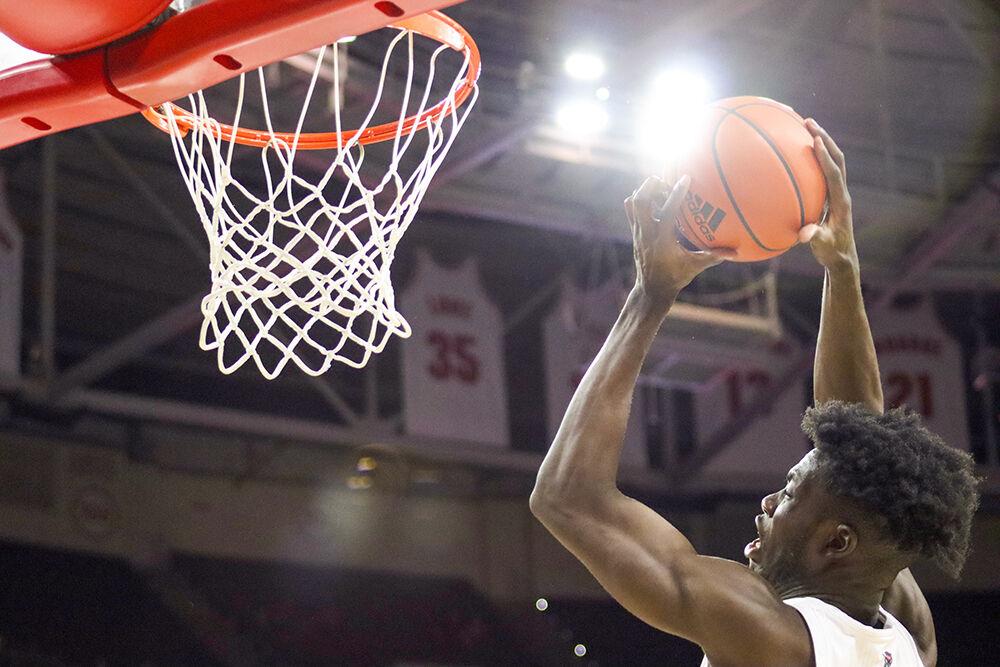 Sophomore forward Ebenezer Dowuona makes a layup&#160;in the men's basketball home game against Virginia at PNC Arena on January 22, 2022.&#160;Dowuona scored six points and had five rebounds. NC State beat Virginia 77-63.&#160;