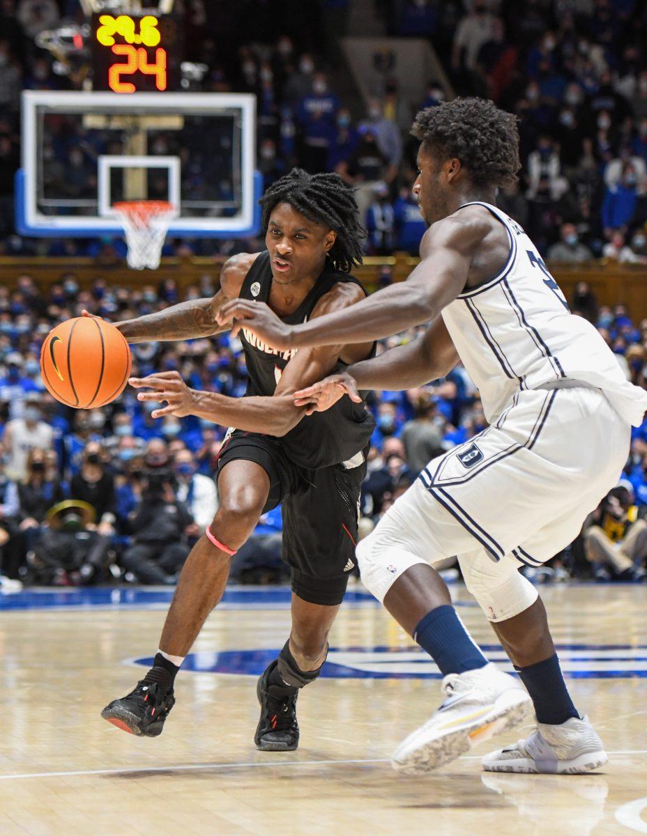 Redshirt sophomore guard Dereon Seabron attempts to break past the Duke defense on Saturday, Jan. 15, 2022 in Cameron Indoor Stadium. Seabron had a double-double against Duke with 16 points and 10 rebounds. The Wolfpack lost to the Blue Devils 88-73.