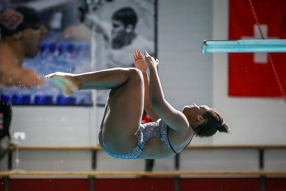 NC State freshman Amari Brown-Swint competes in the women's 1m dive during the NC State Wolfpack's swimming and diving meet against the Duke Blue Devils on Saturday, Jan. 15, 2022.&#160;The Pack men beat the Blue Devils 139-87.