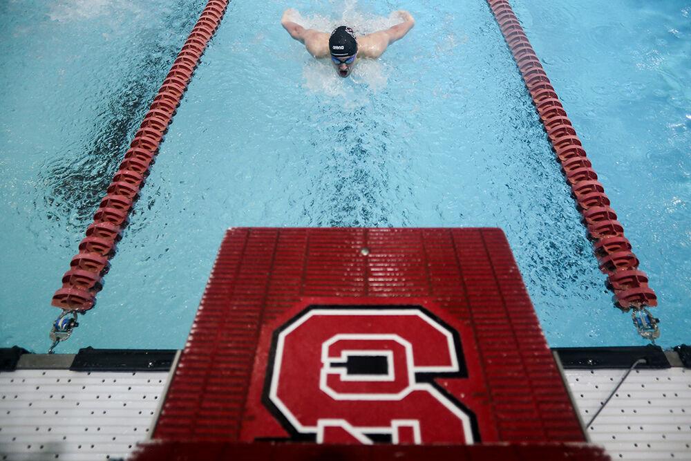 NC State junior Noah Henderson competes in the 200-yard butterfly during the NC State Wolfpack's swimming and diving meet against the Duke Blue Devils on Saturday, Jan. 15, 2022. Henderson won the race with a time of 1:46.01.&#160;The Pack men beat the Blue Devils 167-56.