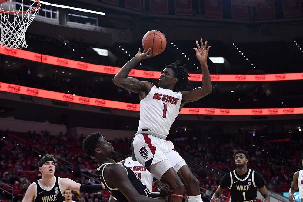 Redshirt sophomore guard Dereon Seabron goes for a shot during the game against Wake Forest in PNC Arena on Wednesday, Feb. 9, 2022. Seabron scored 22 points and had seven rebounds. NC State lost to Wake Forest 69-51.