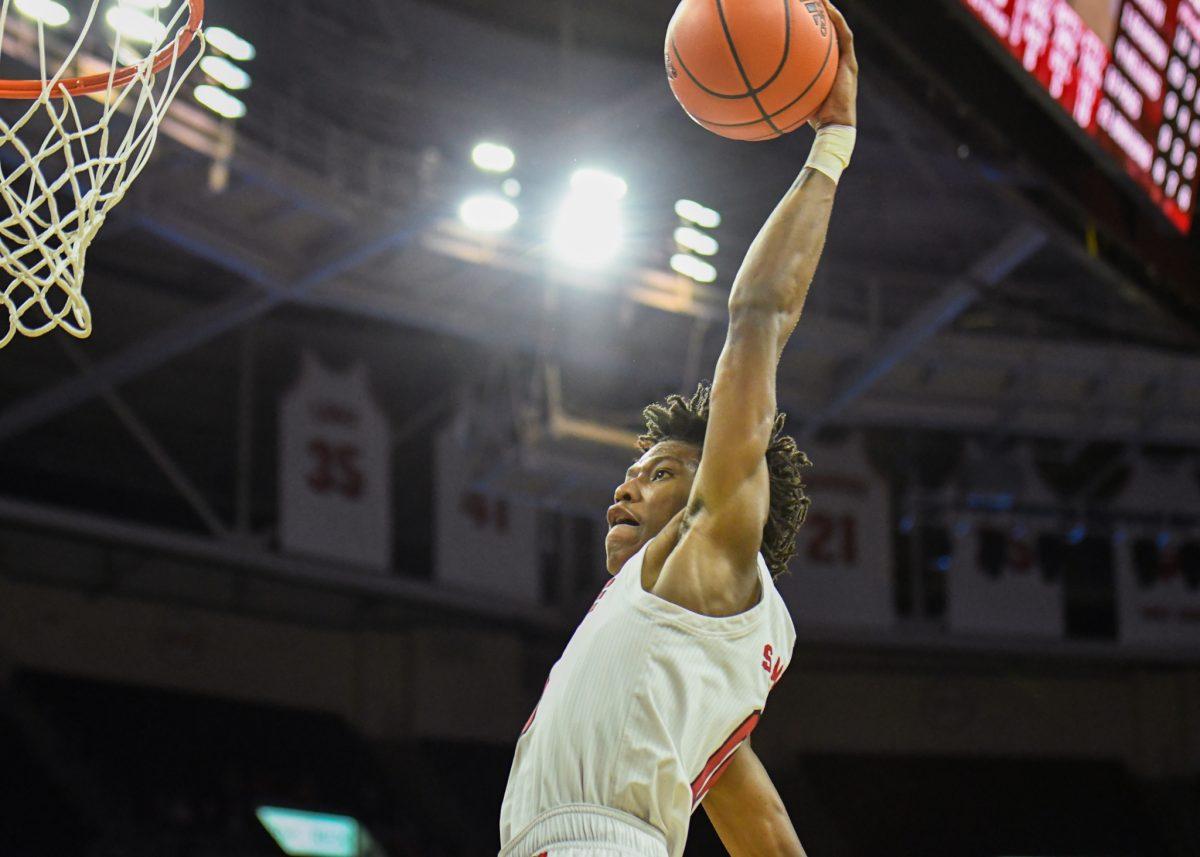 Freshman guard Terquavion Smith goes up for a dunk during the game versus the Boston College Eagles on Wednesday, Feb. 23, 2022 in PNC Arena. Smith led the Wolfpack with 21 points an had 7 rebounds against Boston College. The Wolfpack lost to the Eagles 69-61.&#160;