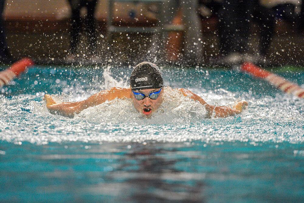 NC State senior Zach Brown competes in the men's 200-yard butterfly during the NC State Wolfpack's swimming and diving meet against the Duke Blue Devils at the Casey Aquatic Center on Saturday, Jan 15, 2022.&#160;The Pack men beat the Blue Devils 167-56.