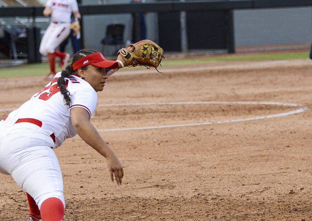 Graduate catcher Taylor Johnson outs an opponent during the game against UNCG on Tuesday, Feb. 22, 2022 in Dail Softball Stadium.NC State beat UNCG 4-3.