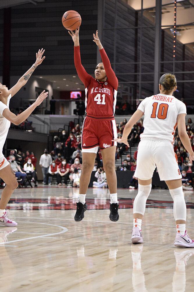 Junior center Camille Hobby puts up a two-pointer against Syracuse during the senior day game on Sunday, Feb. 20, 2022 at Reynolds Coliseum. Hobby scored eight points and had three rebounds. NC State beat Syracuse 95-53.