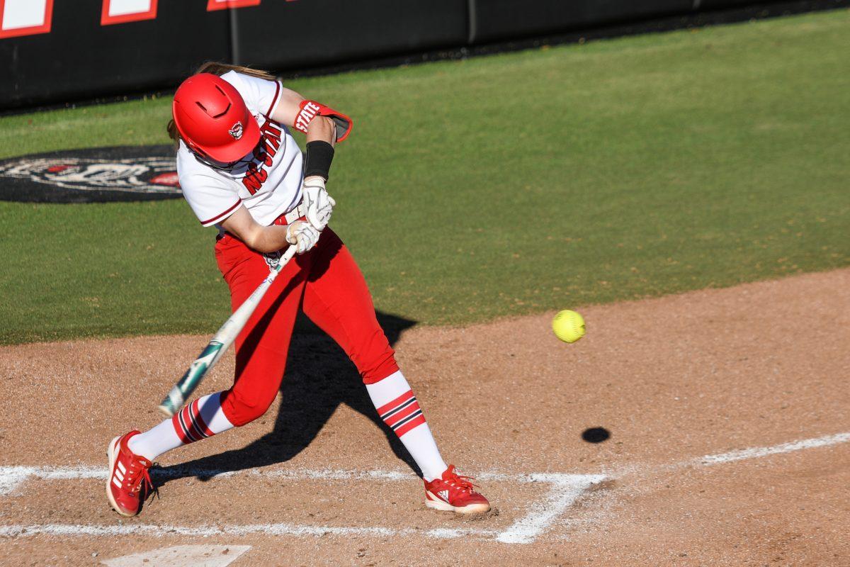 Graduate short stop Randi Farricker hits a home run during the game versus the Fairfield Stags on Saturday, Feb. 19, 2022 in Dail Softball Stadium. Farricker scored 3 runs against the Stags. The Wolfpack beat the Stags 16-1.