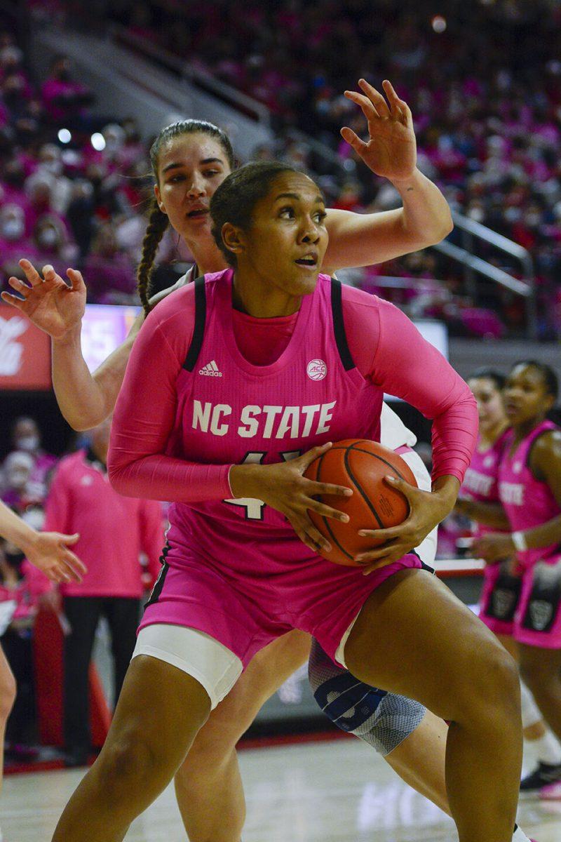 Junior center Camille Hobby evades her Georgia Tech competitors&#160;during NC State's annual Play4Kay game against Georgia Tech on Monday, Feb. 7, 2022 at Reynold's Coliseum. Hobby had eight points throughout the game.&#160;The Pack beat the Yellow Jackets 59-48.