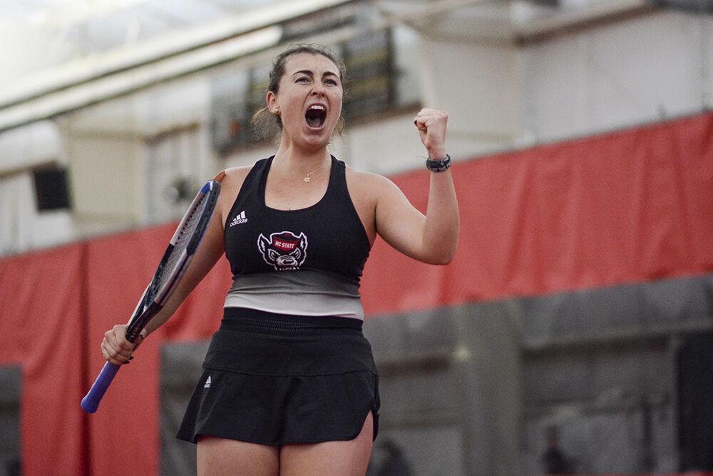 Sophmore Abigail Rencheli celebrates a point during a home tennis match against Wake Forest at J.W. Isenhour Tennis Center on&#160;Sunday, Jan. 30, 2022. The Wolfpack beat the Demon Deacons 4-0.