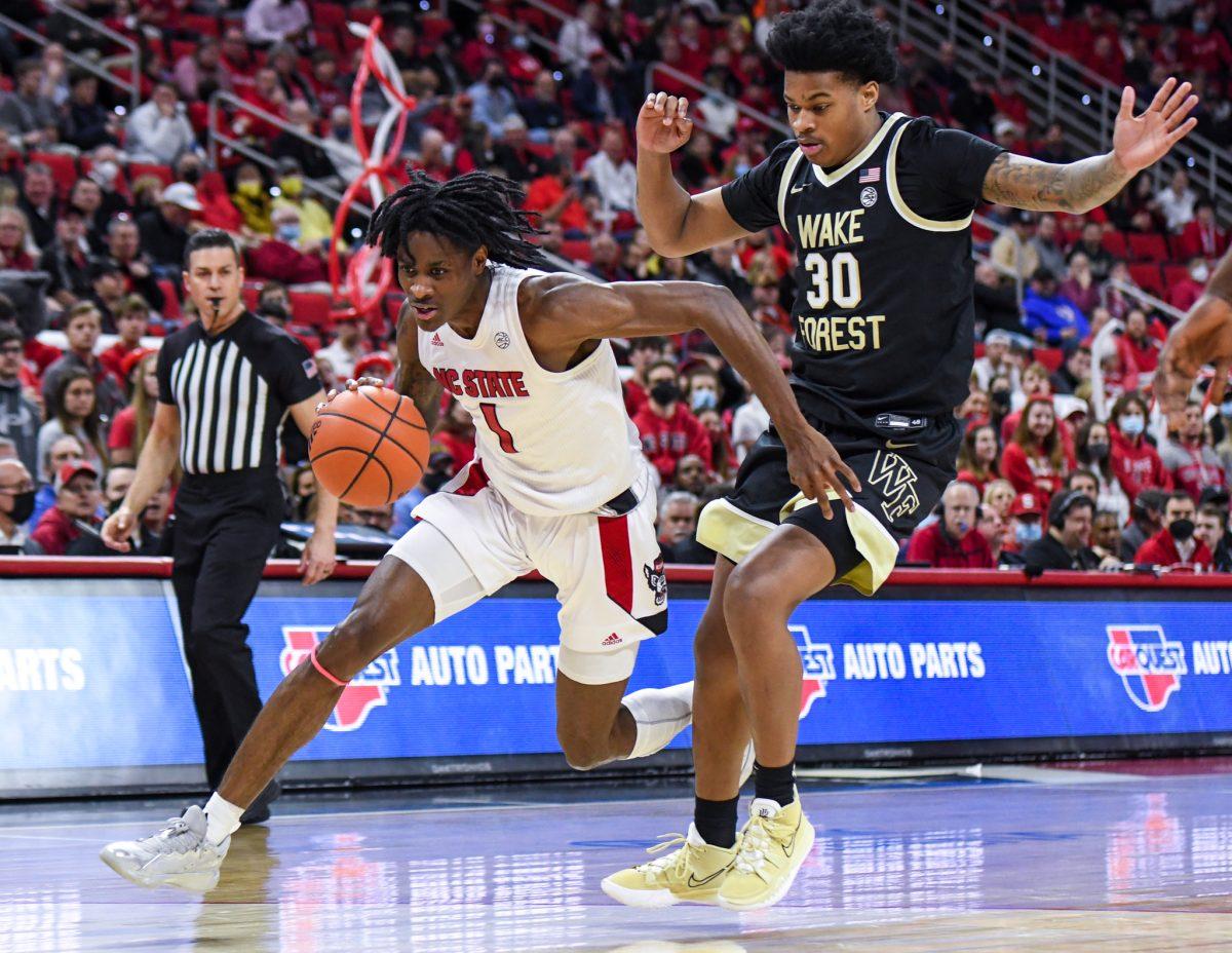 Redshirt sophomore guard Dereon Seabron drives to the basket during the game versus the Wake Forest Demon Deacons on Wednesday, Feb. 9, 2022 in PNC Arena. Seabron carried the Wolfpack with 22 points and seven rebounds. The Wolfpack lost to Wake Forest 69-51.