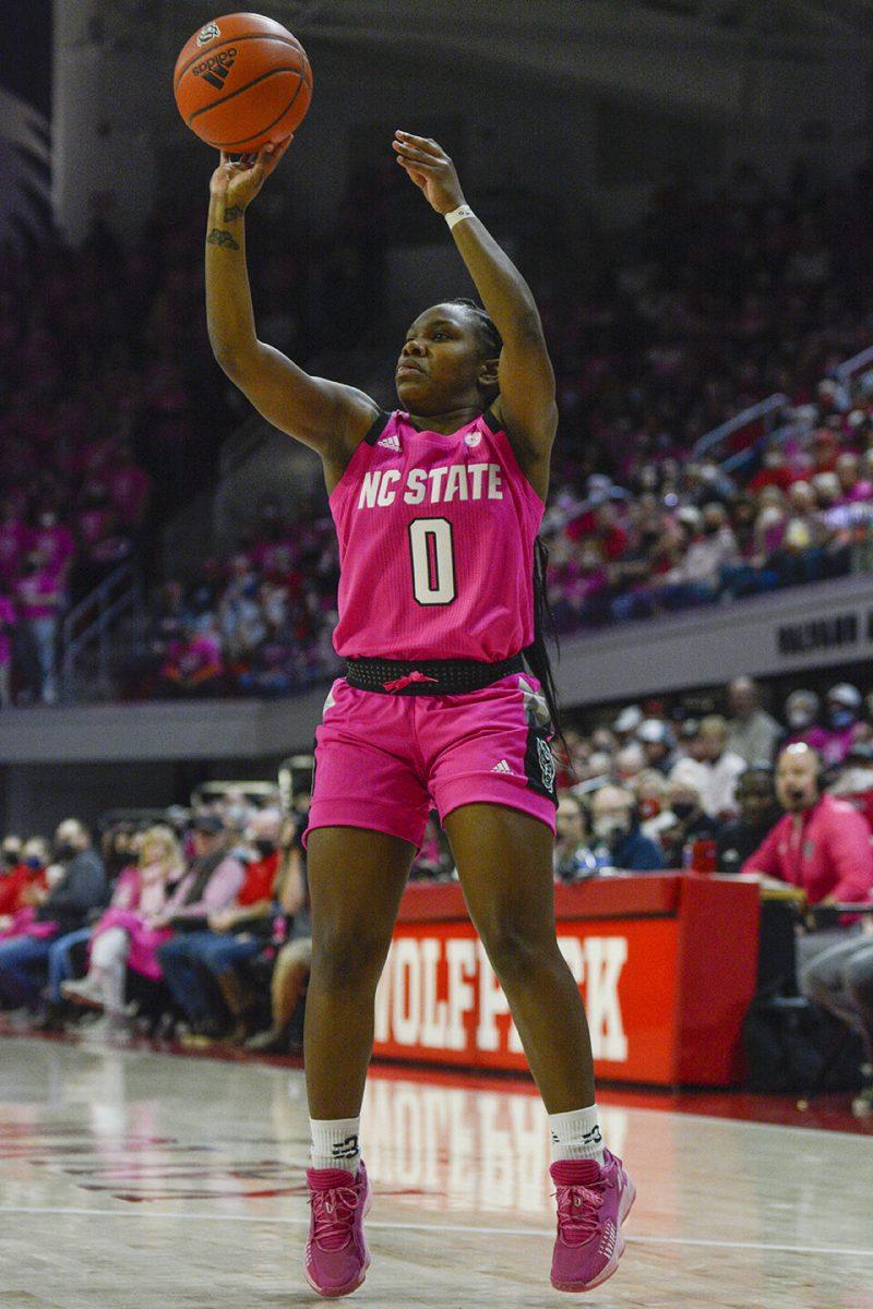 Sophomore guard Diamond Johnson launches the ball during NC State's annual Play4Kay game against Georgia Tech on Monday, Feb. 7, 2022 at Reynold's Coliseum. Johnson had 12 points throughout the game. The Pack beat the Yellow Jackets 59-48.&#160;