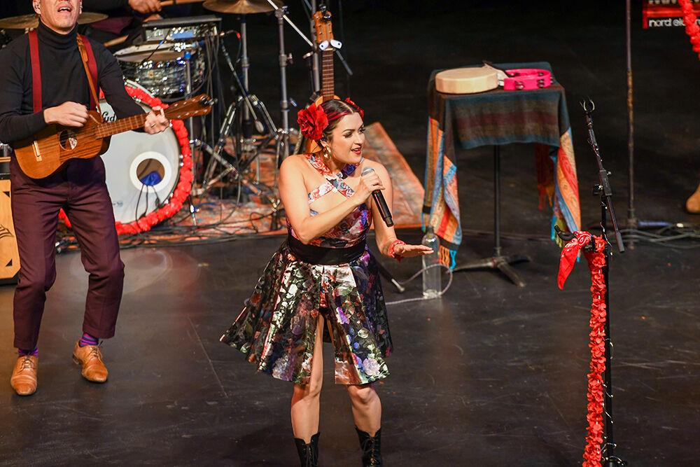 Denise Carlos, one of the members of Las Cafeteras, sings to the crowd on Saturday, Feb. 5, 2022 in Stewart Theatre. Before joining the group, Carlos worked as the Coordinator of the Gender &amp; Sexuality Resource Center at California State University, Los Angeles.
