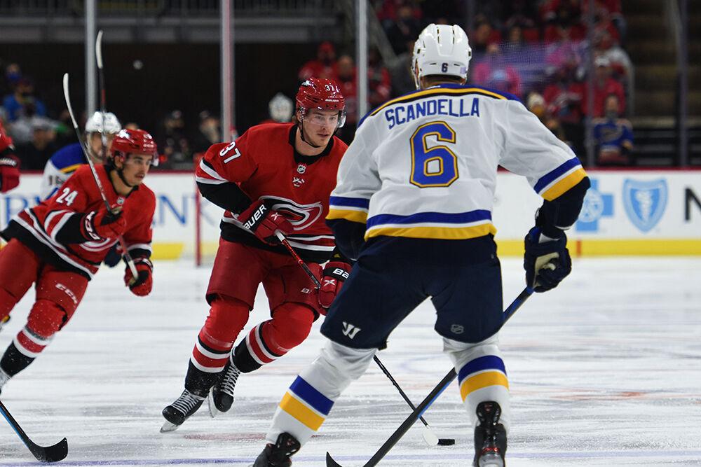 Right wing Andrei Svechnikov carries the puck during the game against the St. Louis Blues in PNC Arena on Saturday, Nov. 13, 2021. The Hurricanes won 3-2.
