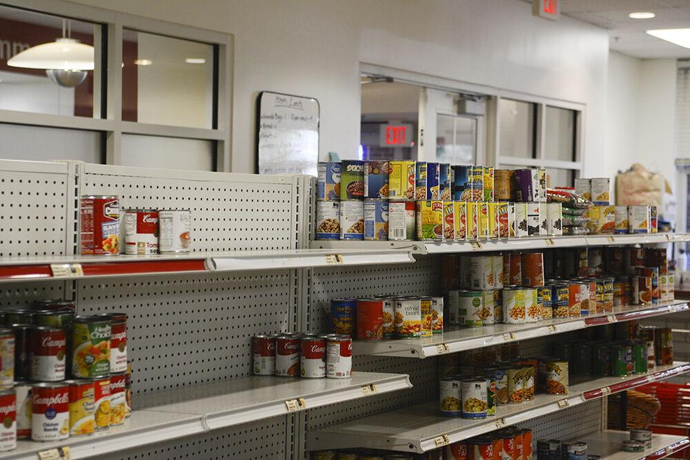 Canned goods sit on shelves at the Feed the Pack food pantry in Quad Commons on Wednesday, Feb. 9, 2022. Feed the Pack is open to all members of the campus community.