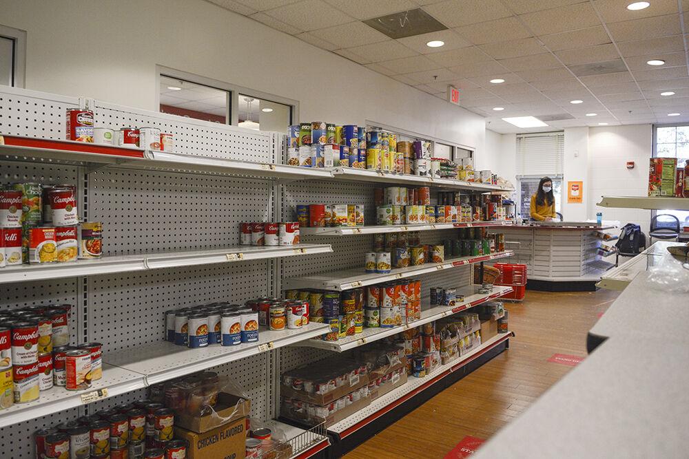 Canned goods sit on shelves at the Feed the Pack food pantry in Quad Commons on Wednesday, Feb. 9, 2022. Feed the Pack is open to all members of the campus community.