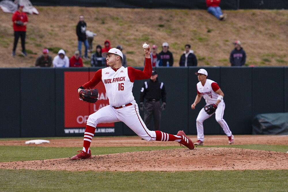 Sophomore pitcher Chris Villaman pitches during Wolfpack's home baseball game against the Quinnipiac Bobcats at Doak Field on Feb. 26, 2022.&#160;The Wolfpack beat the Bobcats 12-10 to win the series.