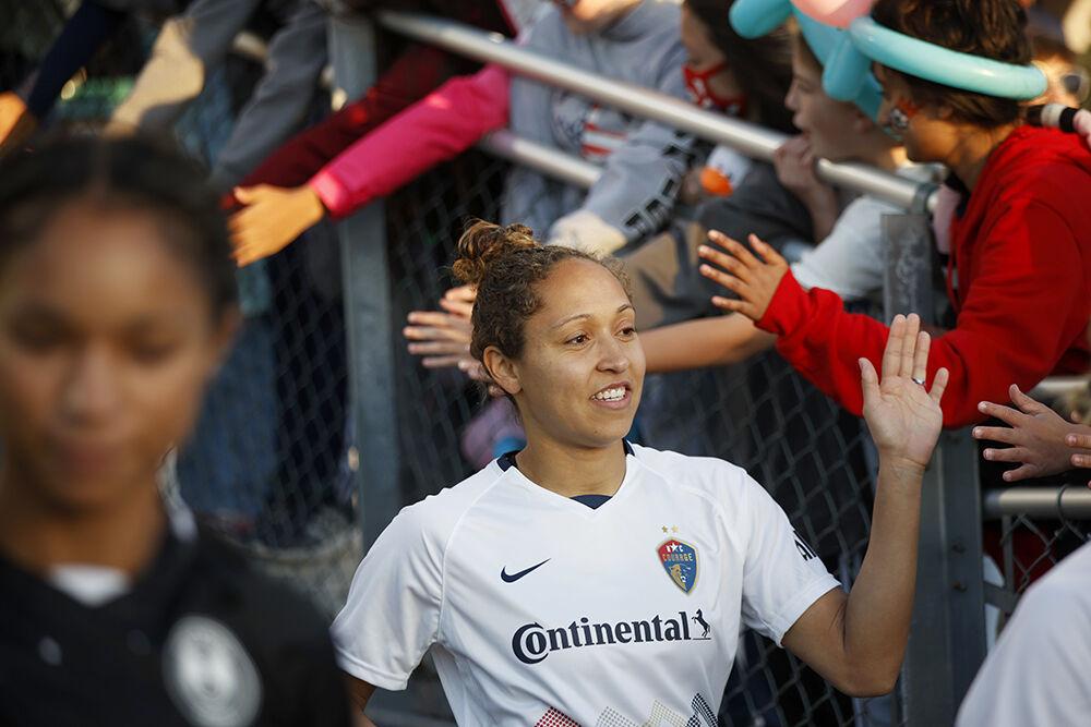 NC Courage defender Jaelene Daniels greets fans before the preseason match against Orlando Pride on Saturday, March 26, 2022 in Sahlen&#8217;s Stadium at WakeMed Soccer Park. NC Courage beat Orlando Pride 1-0.