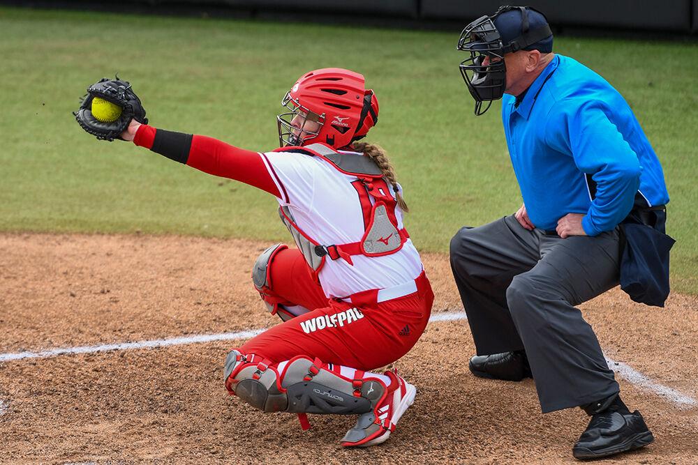 Fifth year catcher Sam Sack catches the ball after a pitch in the game against Central Connecticut State on Saturday, Feb. 26, 2022 at Dail Softball Stadium. Sack hit one home run during the game. NC State beat Central Connecticut State 13-3.