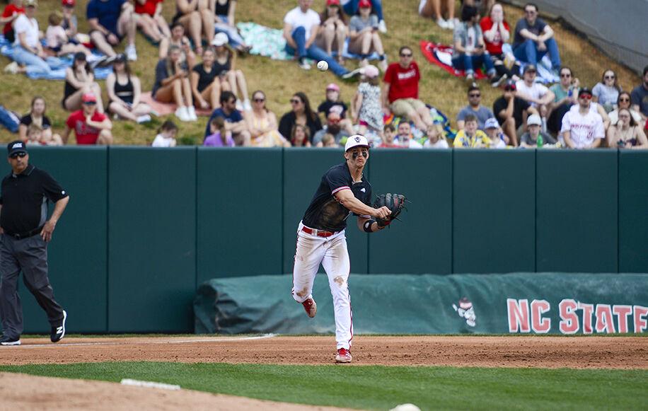 Redshirt junior Josh Hood throws to first during the game against Northeastern on Sunday, Mar. 6, 2022 in Doak Field at Dail Park.&#160;The Wolfpack lost to the Huskies 6-0 and lost the series 3-0.