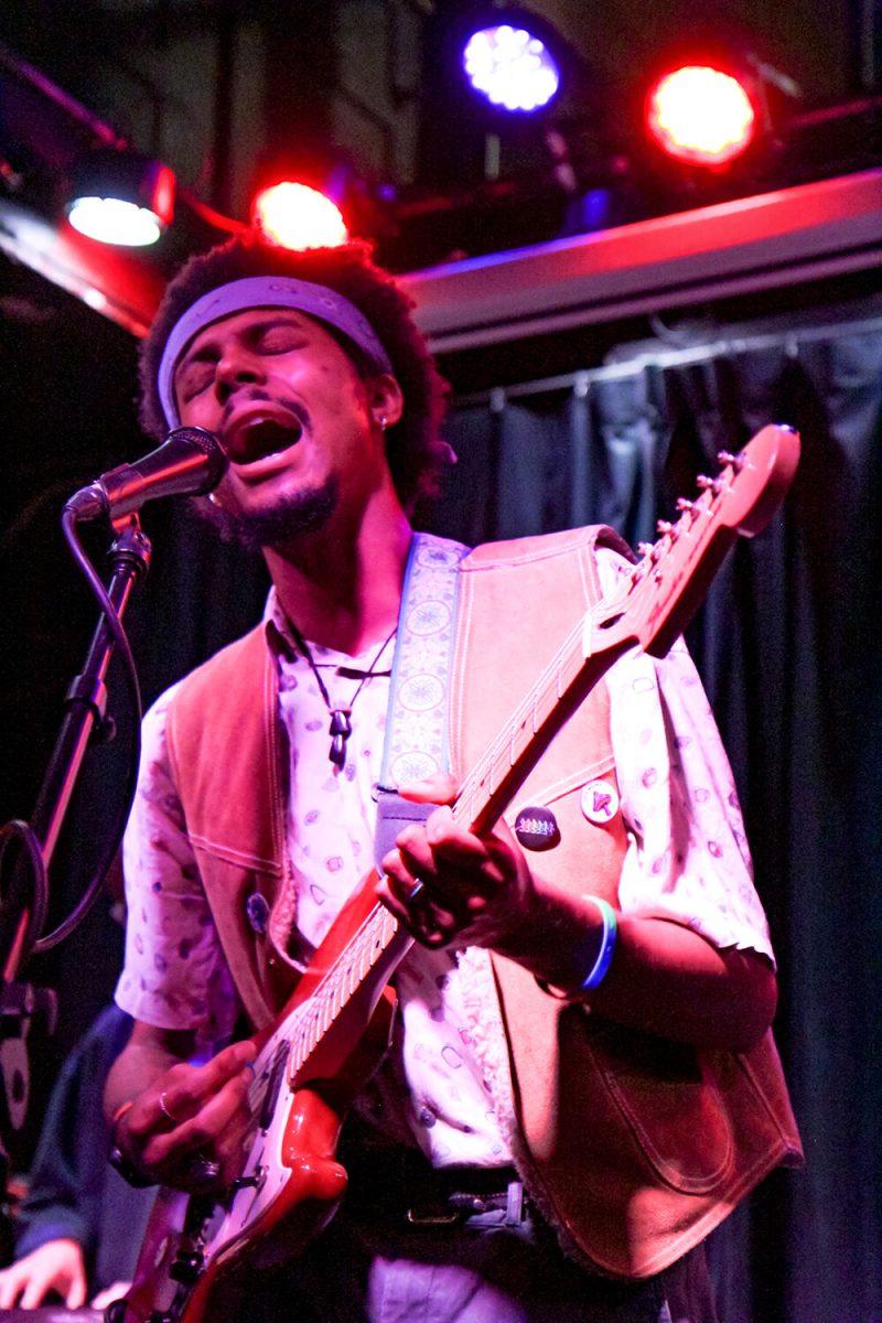 Kenny Wavinson sings into the microphone during the 18th annual Double Barrel Benefit hosted by WKNC at the Pour House Music Hall &amp; Record Shop in Raleigh on March 12, 2022. This event was the first time his band performed on stage together.