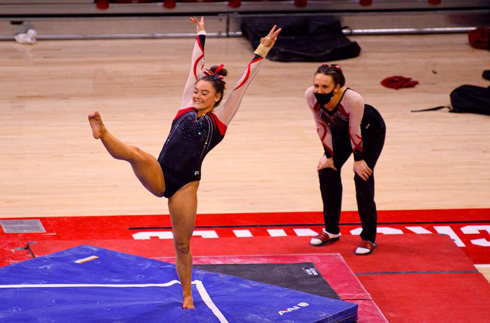 Sophomore Emily Shepard performs her floor routine on Saturday, Feb. 27, 2021 at Reynolds Coliseum. Shepard had the highest all-around score of the meet with a 39.375. The Wolfpack took first place in the tri-meet over North Carolina and Temple with a score of 196.200.