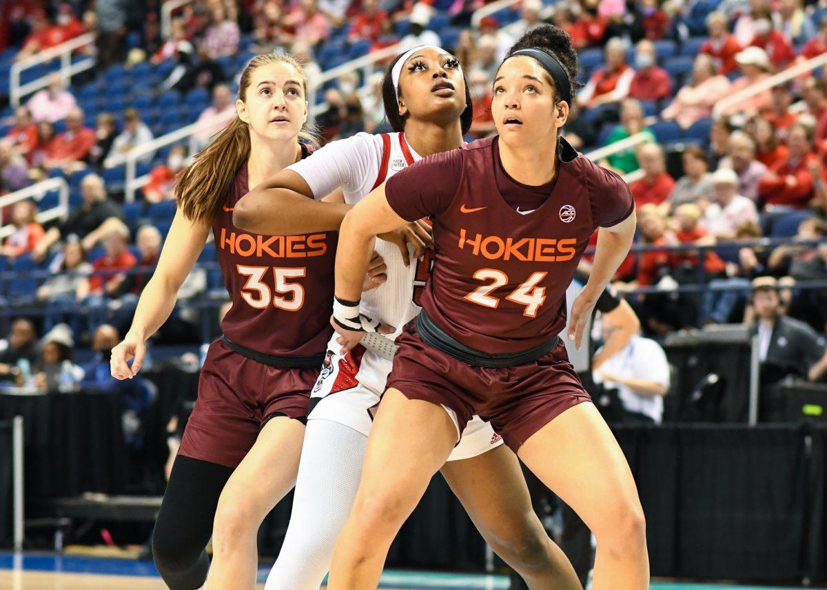 Junior forward Jada Boyd fights to get the rebound during the game versus the Virginia Tech Hokies in the semi-finals of the Women's ACC Tournament on Saturday, March 5, 2022 in the Greensboro Coliseum. Boyd scored 16 points and had four rebounds against Virginia Tech. The Wolfpack beat the Hokies 70-55.