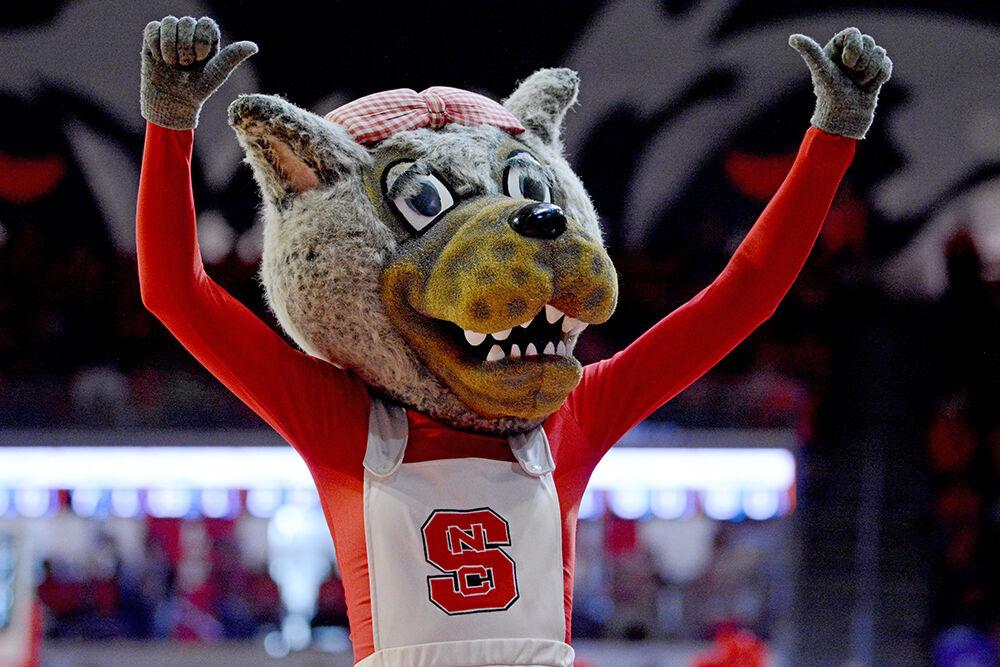 Mrs. Wuf cheers on the crowd during the second round of the NCAA women&#8217;s basketball tournament against Kansas State at Reynolds Coliseum on Monday, March 21, 2022. The Wolfpack beat the Wildcats 89-57 and advance to the Sweet 16.