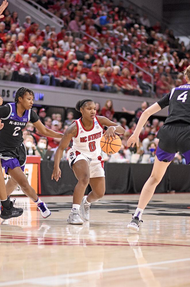Sophomore guard Diamond Johnson moves around defenders during the second round of the NCAA tournament against Kansas State on Monday, March 21, 2022 at Reynolds Coliseum. Johnson scored 15 points during the game. The Wolfpack beat the Wildcats 89-57.