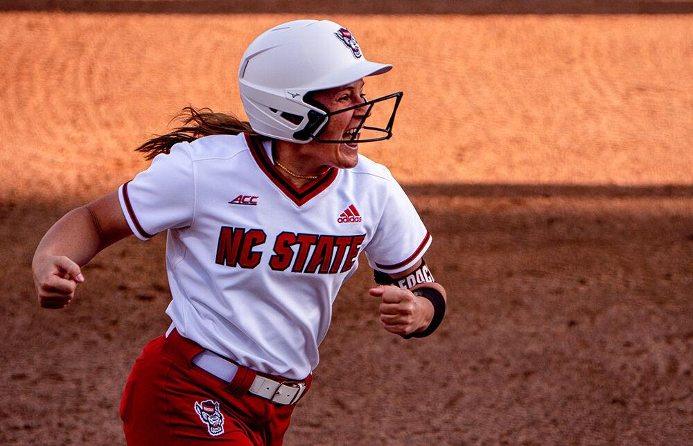 Redshirt junior infielder Logan Morris celebrates her home run against No. 15 LSU on Friday, April 16, 2021 at Dail Softball Stadium. Morris went 2-3 with three runs batted in as the Wolfpack won 3-1.