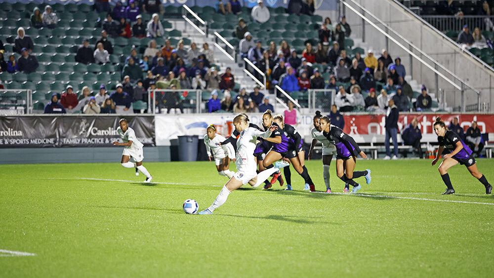 NC Courage defender Merritt Mathias takes a penalty kick in the second half of the preseason match against Orlando Pride on Saturday, March 26, 2022 in Sahlen&#8217;s Stadium at WakeMed Soccer Park. NC Courage had 61% possession during the match with 17 shots. NC Courage beat Orlando Pride 1-0.