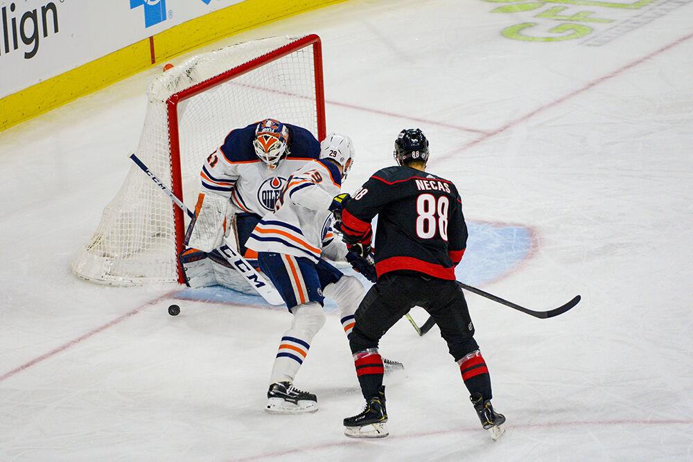 Carolina Hurricanes center Martin Necas watches the puck pass the goal during the game against the Edmonton Oilers on Sunday, Feb. 27, 2022 in PNC Arena. Necas had two shots during the game. The Hurricanes beat the Oilers 2-1.