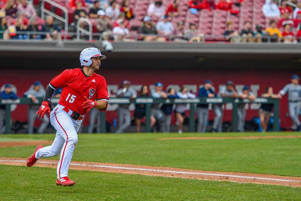 Senior infielder J.T. Jarrett runs to first base in the game against Longwood on Wednesday, Feb. 23, 2022 at Doak Field. Jarrett went 1 for 2 in during the game. The Wolfpack won the game versus the Lancers 19-3.