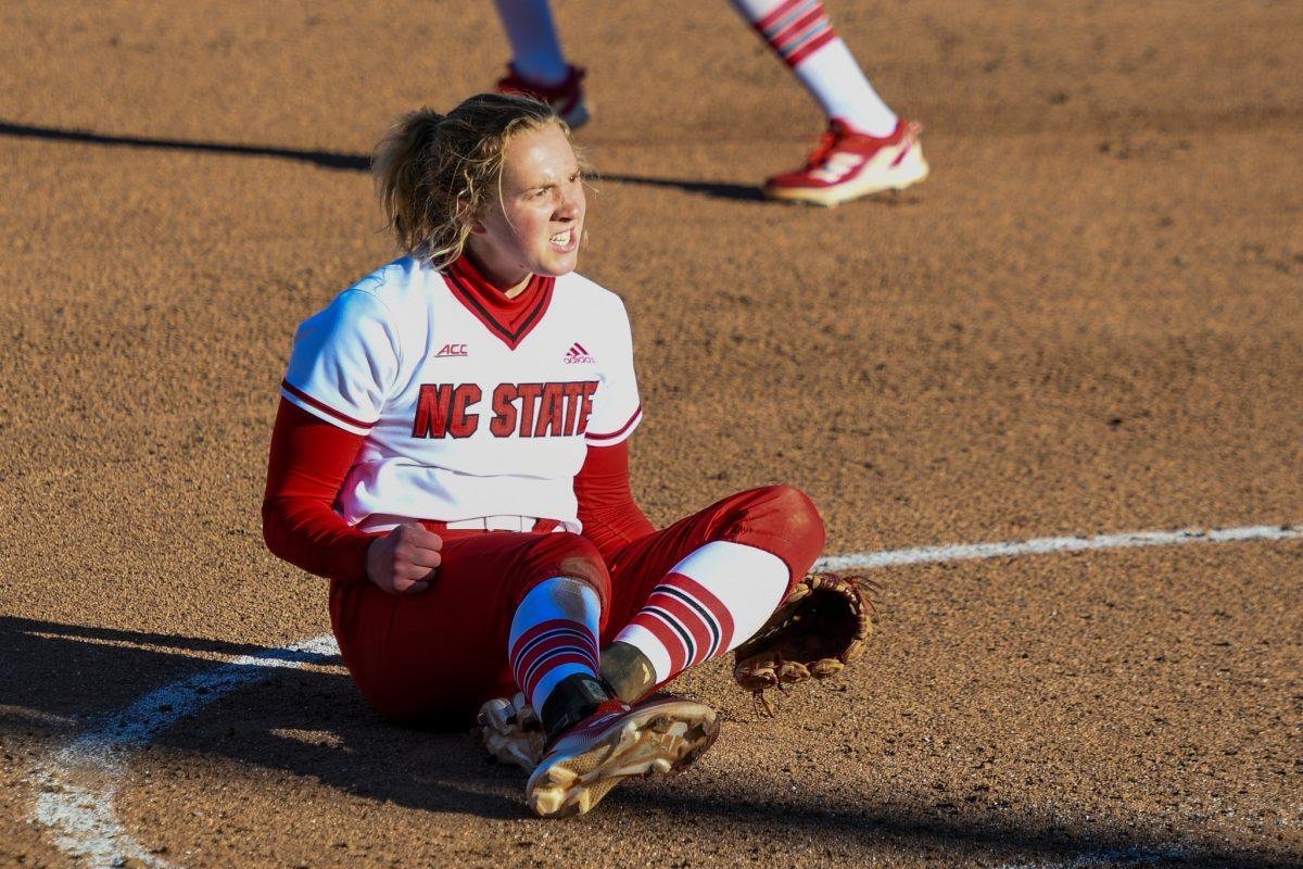 Redshirt sophomore Sam Gress celebrates after throwing the ball to first base to tag out the Fairfield runner on Saturday, Feb. 19, 2022 in Dail Softball Stadium. Gress struck out 3 batters during the game against the Fairfield Stags. The Wolfpack beat the Stags 16-1.
