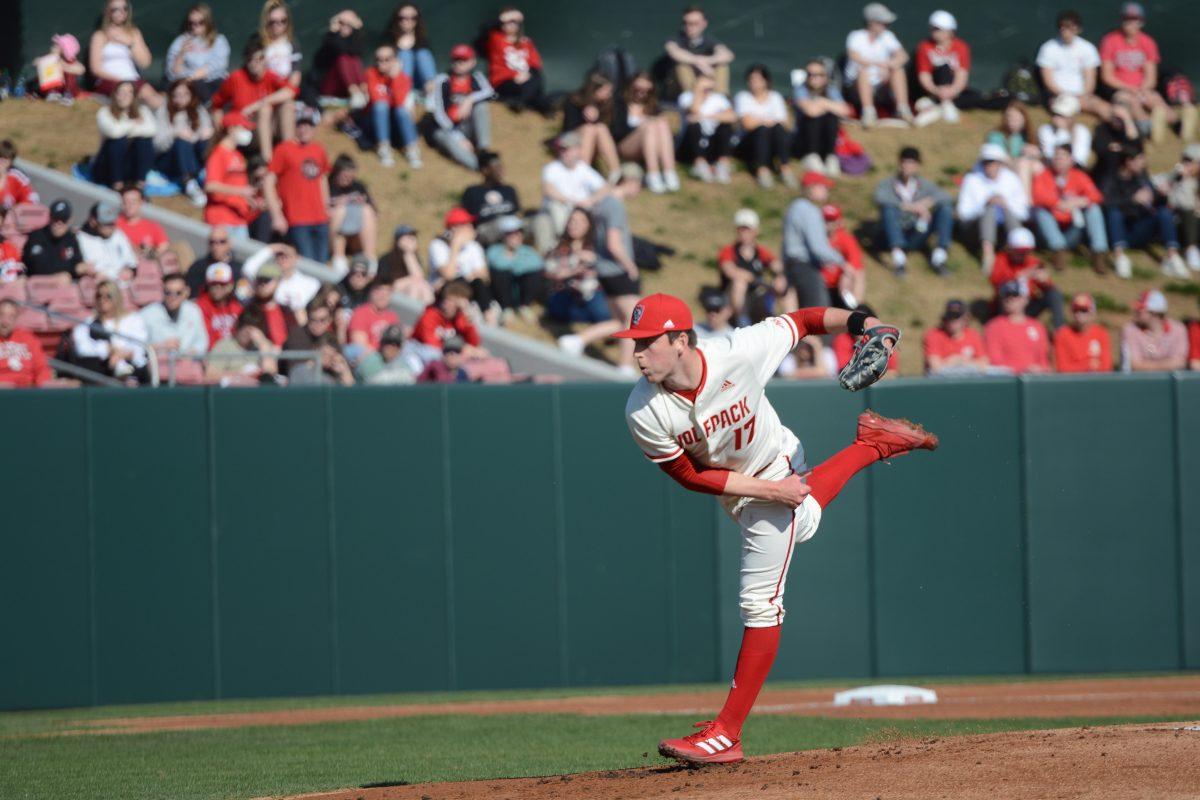 Sophomore pitcher Sam Highfill pitches during the game against Northeastern on Friday, March 4, 2022 in Doak Field at Dail Park. The Wolfpack lost to the Huskies 6-1.