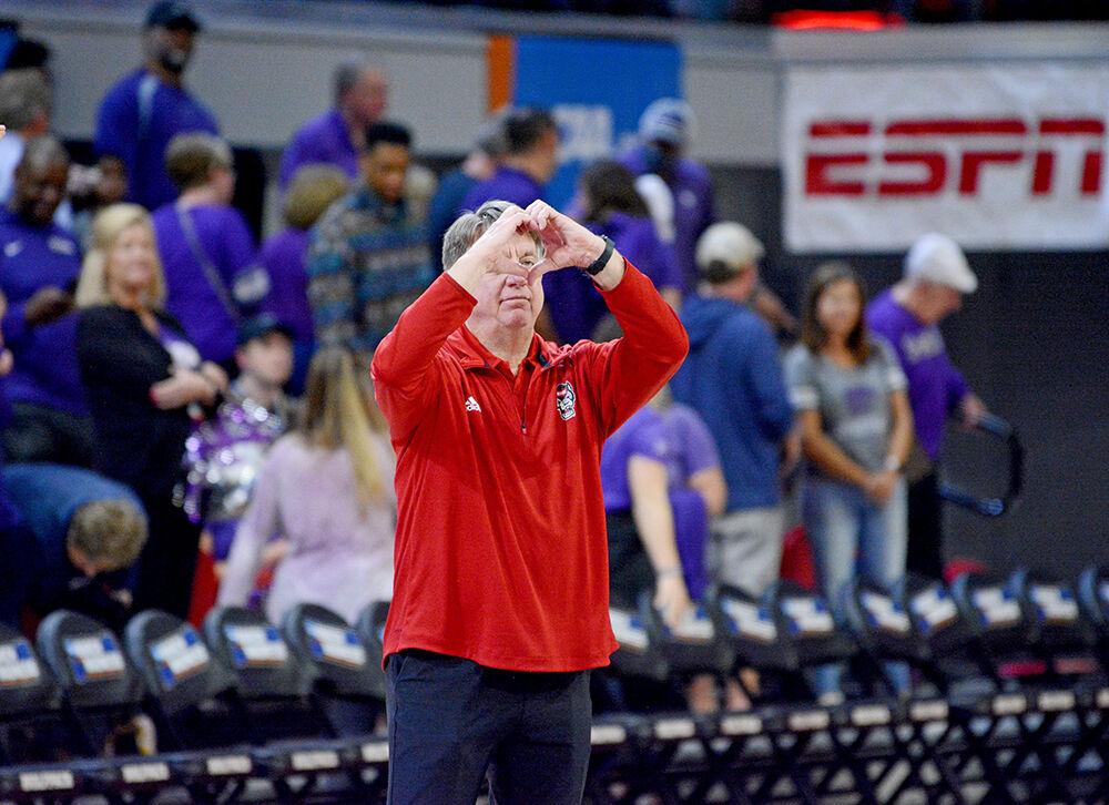 NC State head coach Wes Moore thanks the fans after the second round game of the NCAA tournament against Kansas State at Reynolds Coliseum on Monday, March 21, 2022. NC State beat Kansas State 89-57.