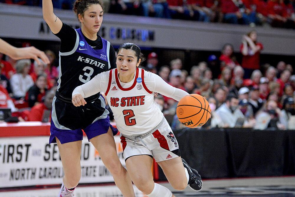 Graduate guard Raina Perez pushes past a defender during the second round game of the NCAA tournament against Kansas State on Monday, March 21, 2022 at Reynolds Coliseum. Perez scored 15 points for the team. The Wolfpack beat the Wildcats 89-57 and advance to the next round.