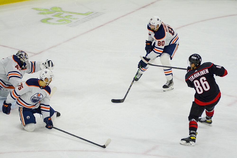 Carolina Hurricanes left wing Teuvo Ter&#228;v&#228;inen scores the first goal of the day during the game against the Edmonton Oilers on Sunday, Feb. 27, 2022 in PNC Arena. Ter&#228;v&#228;inen&#160;had one goal and one assist during the game. The Hurricanes beat the Oilers 2-1.
