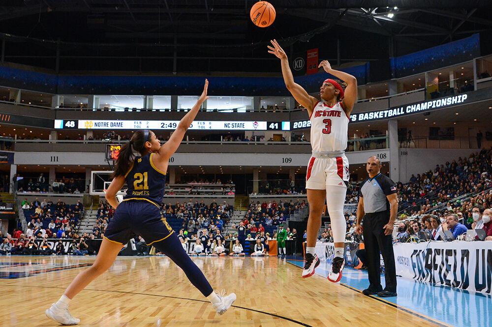 Graduate student guard Kai Crutchfield shoots a 3-pointer in the Sweet 16 game against Notre Dame on Saturday, March 26, 2022 inside Total Mortgage Arena in Bridgeport, Connecticut. Crutchfield scored 14 points for the Wolfpack. NC State beat Notre Dame 66-63.