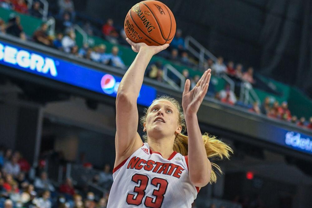 Senior center Elissa Cunane goes up for a layup during the game against the Florida State Seminoles on Friday, Mar. 04, 2022 in Greensboro Coliseum. Cunane scored 15 points and had six rebounds against Florida State. The Wolfpack beat the Seminoles 84-54.