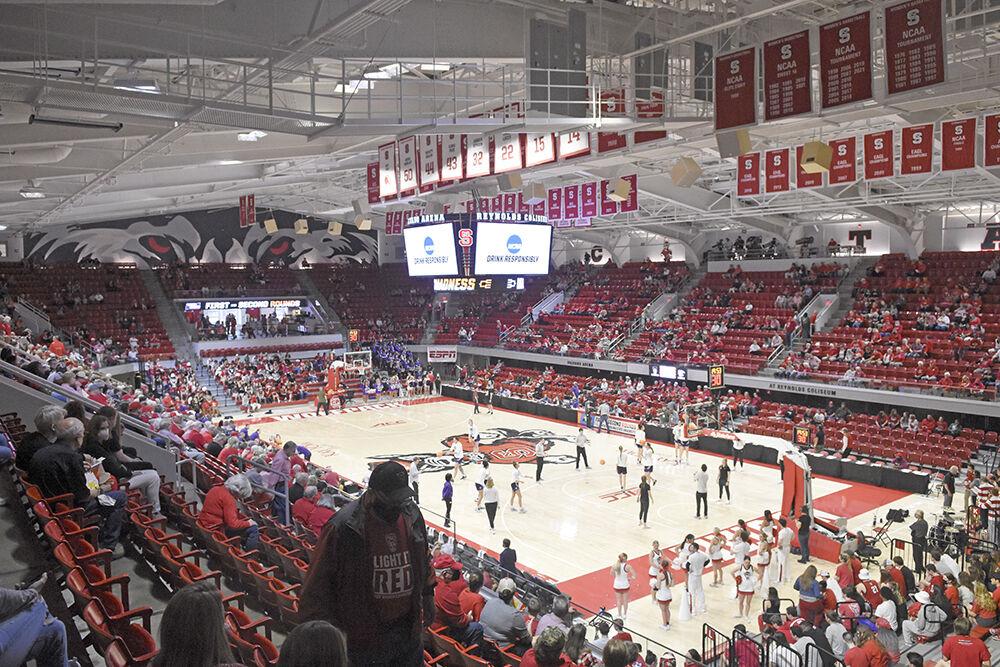 Fans file in to watch the second round of the NCAA tournament against Kansas State on Monday, March 21, 2022 at Reynolds Coliseum. NC State hosted the first two rounds of the tournament and beat Kansas State in this game 89-57 to advance to the Sweet 16.