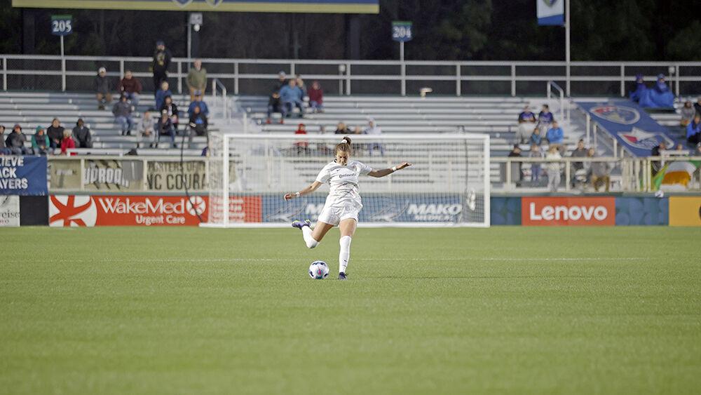 NC Courage defender Malia Berkely kicks the ball down the field during the preseason match against Orlando Pride in Sahlen&#8217;s Stadium at WakeMed Soccer Park on Saturday, March 26, 2022. NC Courage beat Orlando Pride 1-0.