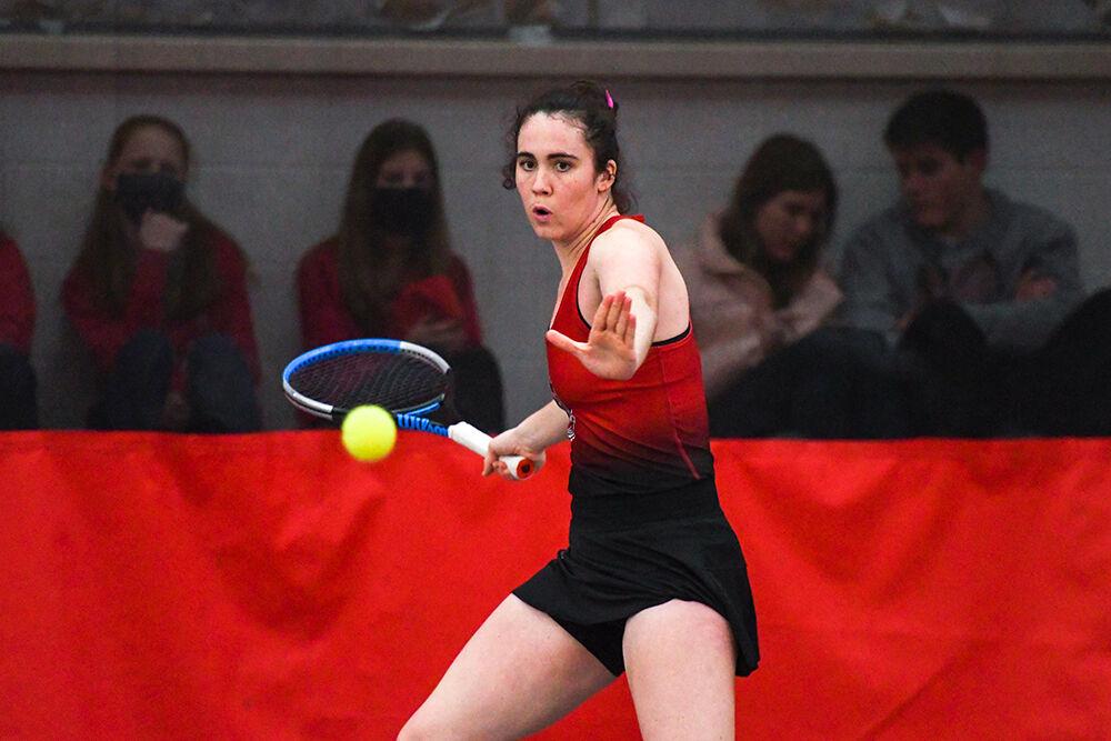 Senior Nell Miller gets ready to hit the ball in a singles match against the University of South Carolina on Sunday, Feb. 6, 2022 at J.W. Isenhour Tennis Center. Miller won both of her singles matches against Gamecock Elise Mills with scores of 6-4 and 6-3, respectively. The Wolfpack won the match 7-0 versus the Gamecocks.