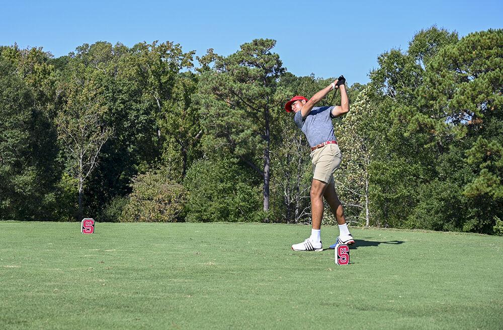 Junior Spencer Oxendine tees off during the Wolfpack Intercollegiate on Oct. 16, 2021 at Lonnie Poole Golf Course. Oxendine tied for ninth overall with a score of three-under. The NC State men's golf team won the tournament with a combined score of 17-under par.&#160;