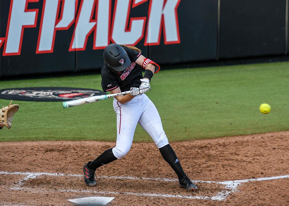 Graduate infielder Randi Farricker hits a home run during the game versus the Campbell Camels on Tuesday, March 22, 2022 in Dail Softball Stadium. The Wolfpack beat the Camels 2-0.